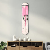 Pink grunge portrait snowboard glass wall art by Artdesigna featuring a vibrant, edgy design suitable for modern decor.