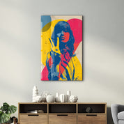 Colorful bold pop art portrait on glass wall art by Artdesigna, featuring vibrant abstract face design.