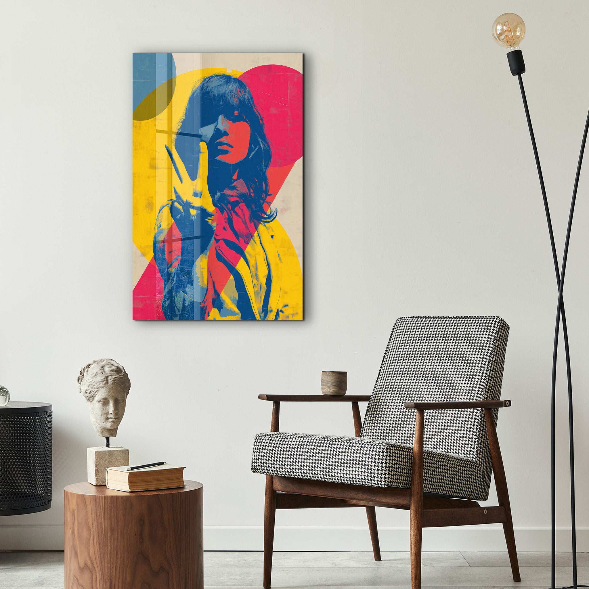 Colorful glass wall art featuring a bold pop portrait design by Artdesigna, titled Peace Muse, displayed on a wall.