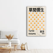 Yellow polka dot glass wall art by Yayoi Kusama, featuring vibrant Japanese pop art design from Artdesigna.
