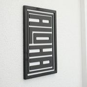 Modern wooden typography wall art spelling "ALOHA" by Artdesigna, featuring natural wood finish on a neutral background.