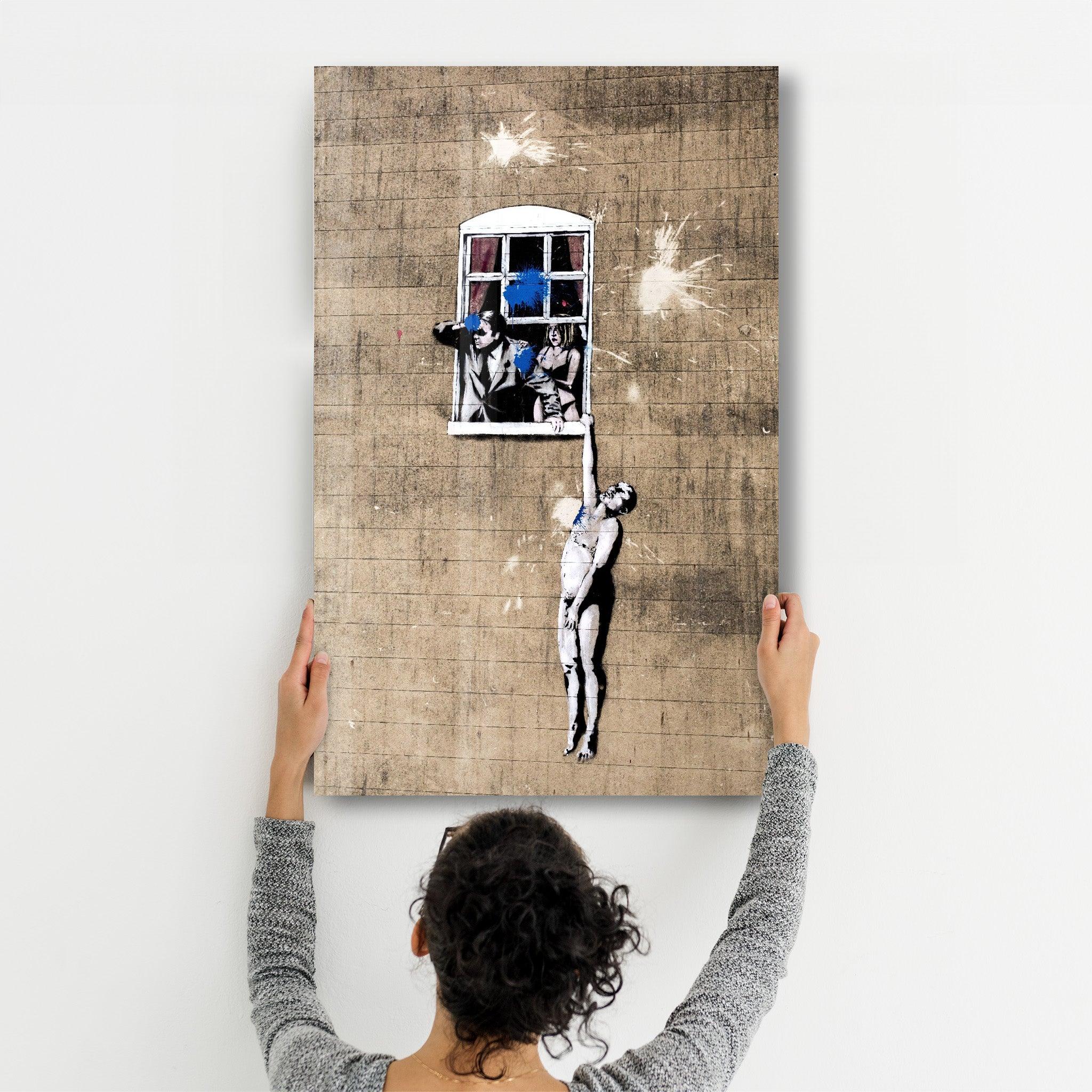 Banksy - Man hanging from a window | Glass Wall Art - Artdesigna