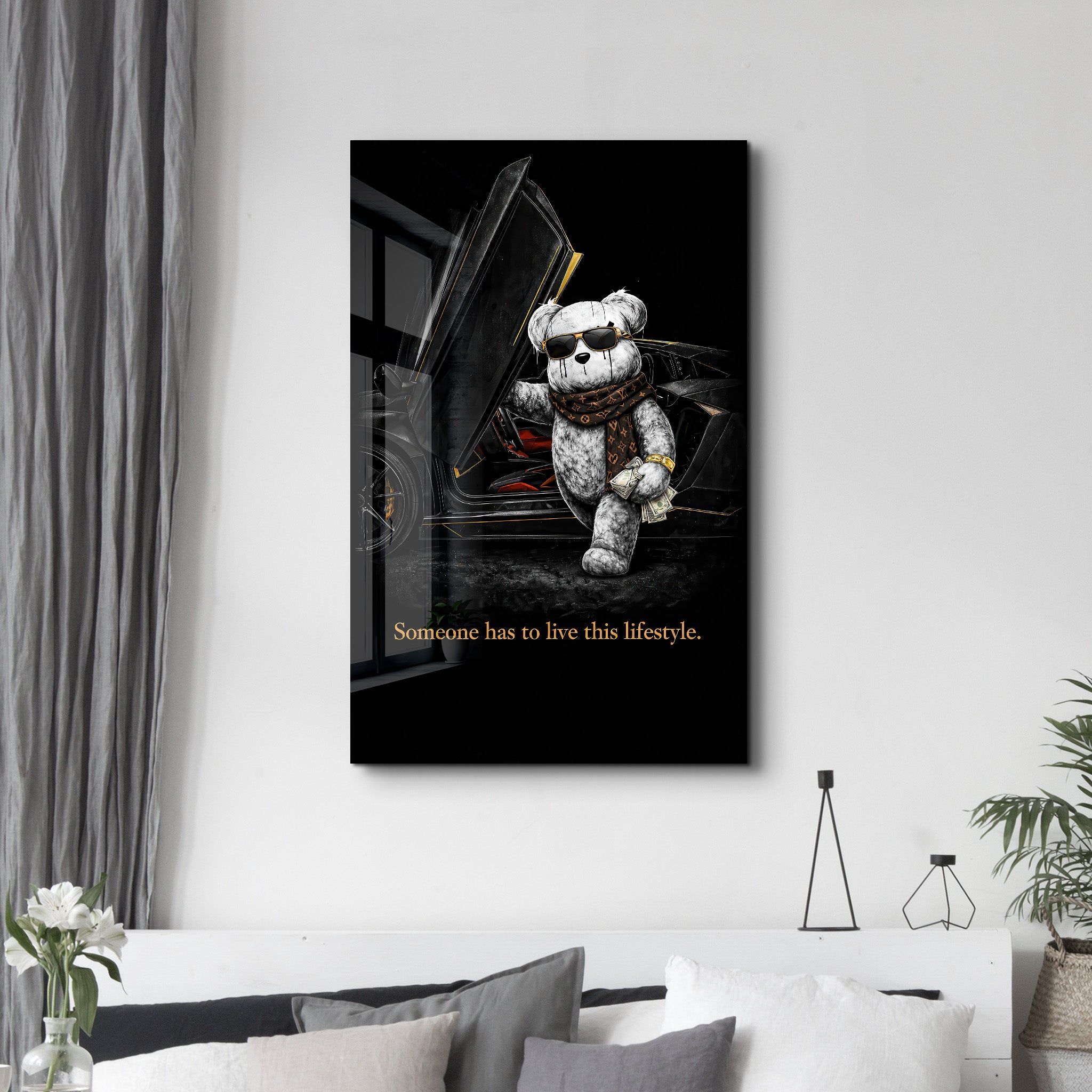 Glass wall art from Artdesigna featuring the quote "Someone has to live this lifestyle" on clear, decorative glass panel.