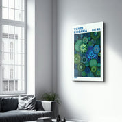 Yayoi Kusama Emerald Infinity glass wall art by Artdesigna featuring intricate patterns and vibrant green hues.