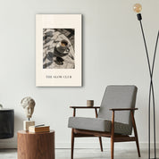 The Slow Club Artdesigna glass wall art displayed in a modern interior frame