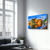 Bruges, Belgium. The Rozenhoedkaai canal in Bruges with the Belfry | Glass Wall Art - Artdesigna