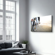 Riding A Bike On The Calm Beach | Glass Wall Art - Artdesigna