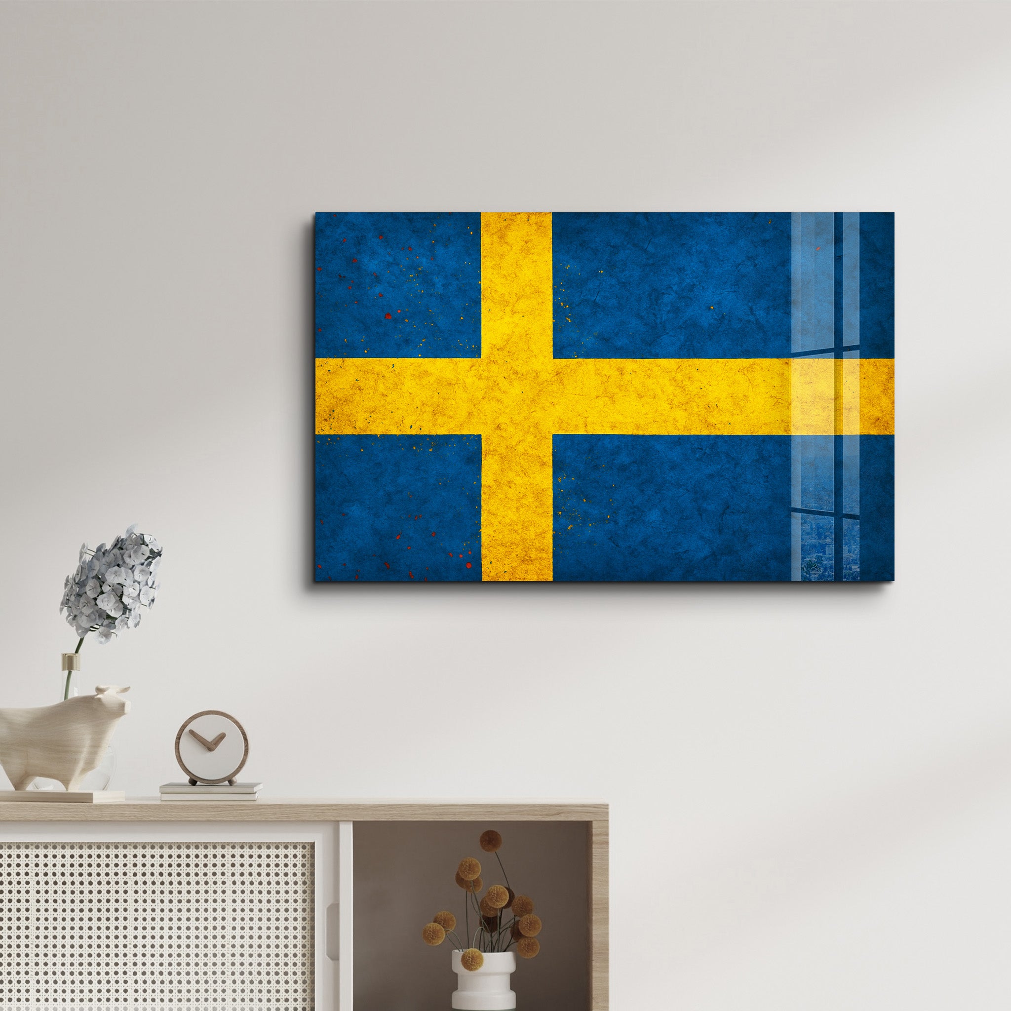Sweden Flag Splash glass wall art by Artdesigna featuring vibrant blue and yellow colors on clear glass wall decor.