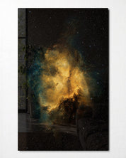 Glass wall art featuring a golden cloud against a black sky, designed by Artdesigna, showcased in the front view.