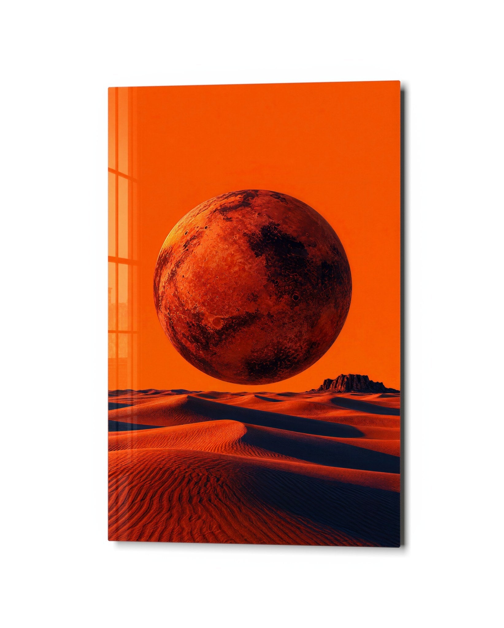 Glass wall art featuring a rust moon above sand scene by Artdesigna, showcasing artistic glass craftsmanship on a wall display.