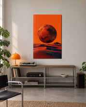 Glass wall art featuring a rust moon above sand scene by Artdesigna, displayed on a modern living room wall.
