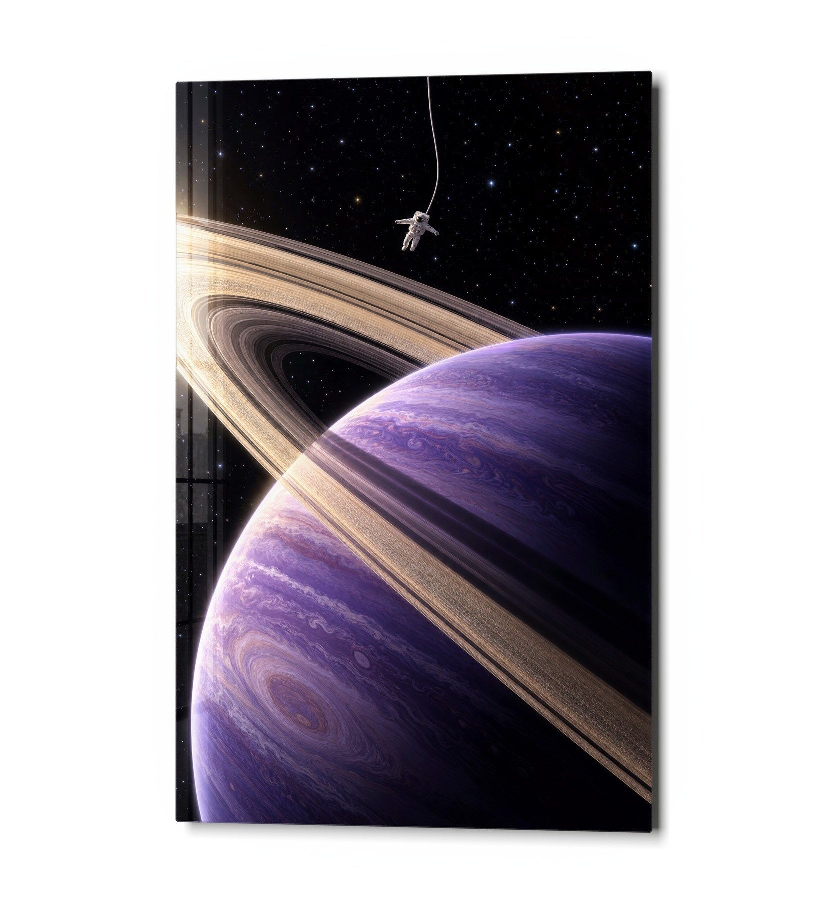 Small astronaut glass wall art with large rings, featuring a modern design by Artdesigna displayed against a neutral background.