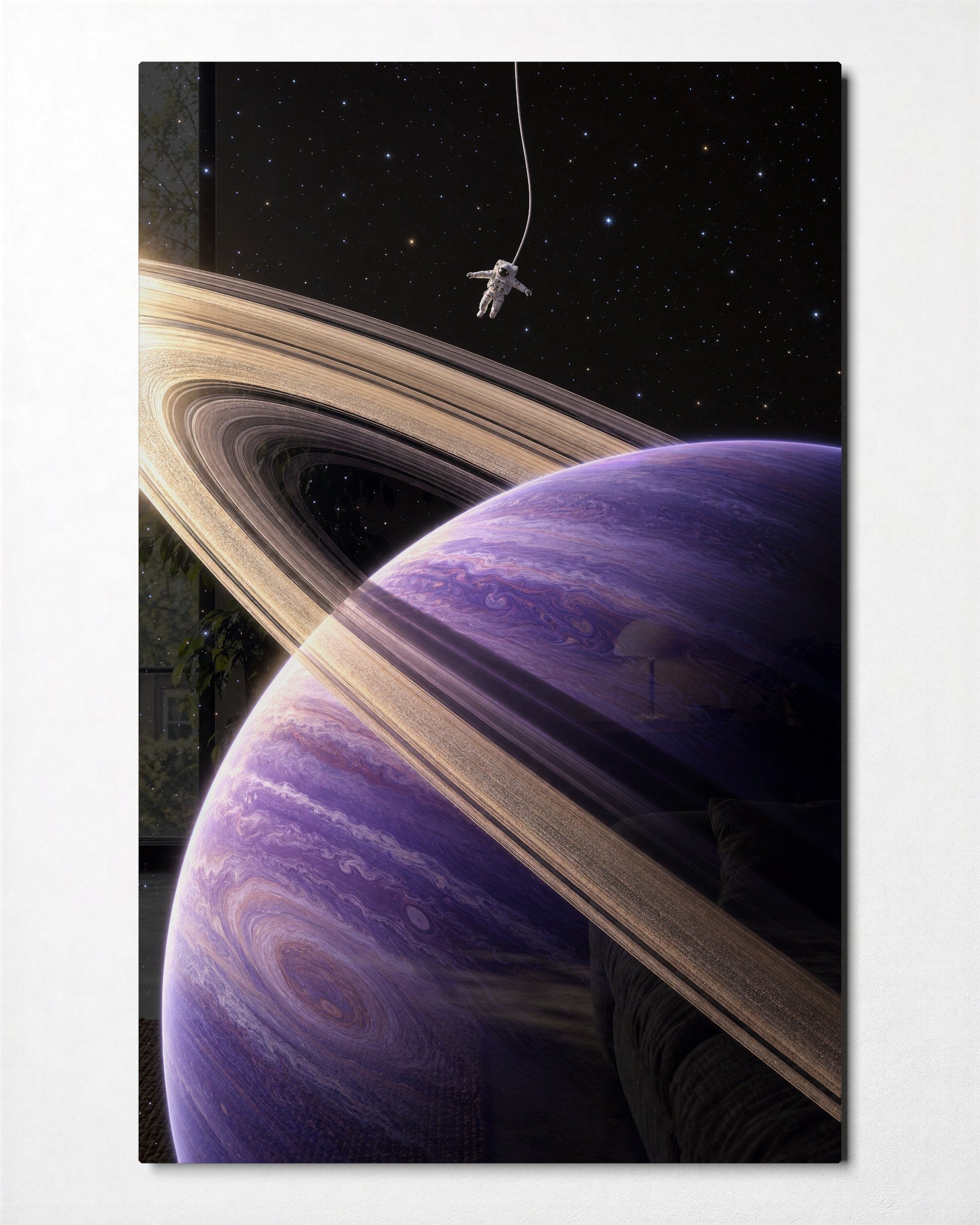Small astronaut glass wall art by Artdesigna featuring a tiny astronaut figure surrounded by large rings, modern wall decor piece.