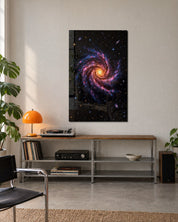 Pink glass wall art with spiral arm design by Artdesigna displayed on a modern wall setting.