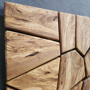 Handmade olive wood geometric wall sculpture by Artdesigna, showcasing intricate wooden wall art with natural grain details.